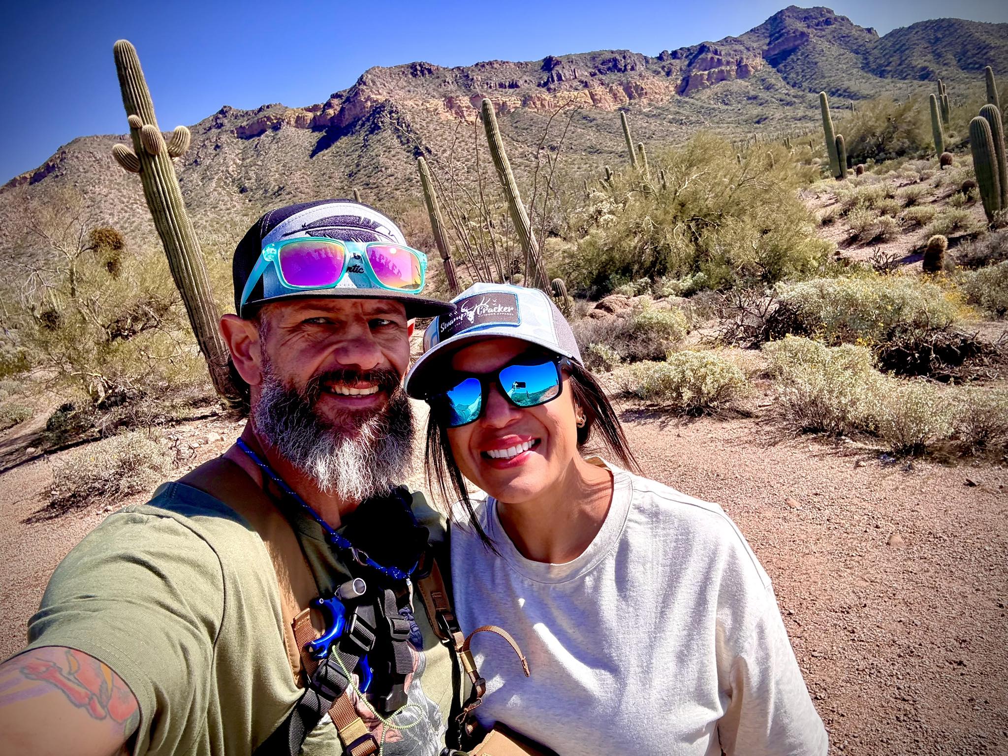 Jimmy and Aimee smiling in the Tucson desert