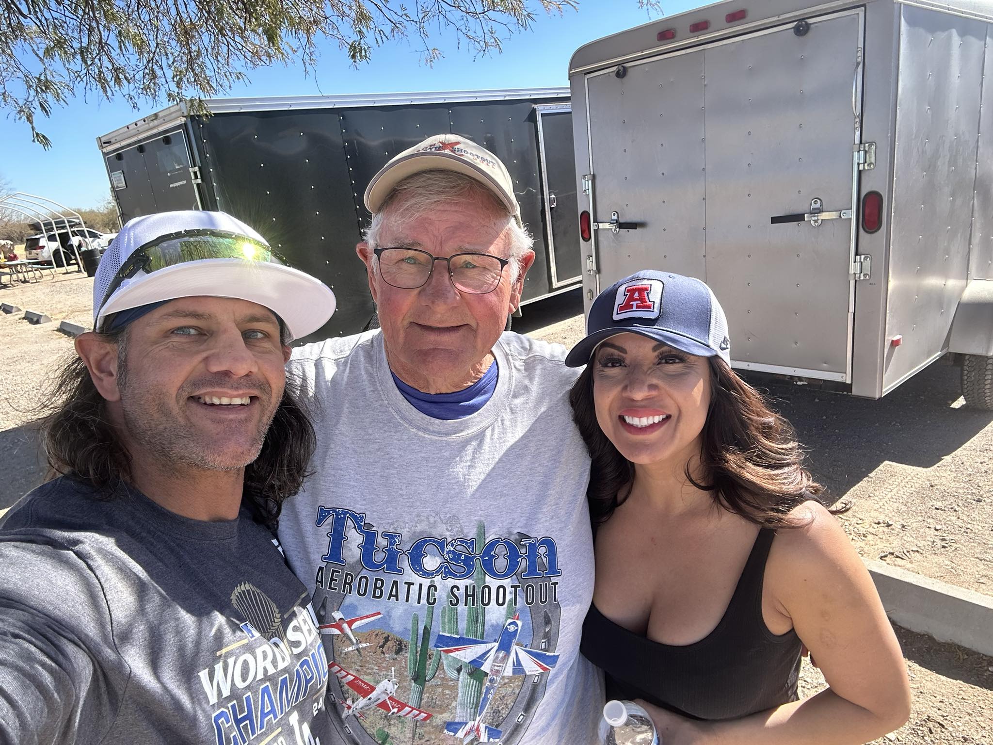 Jimmy, Aimee, and Dad Maguire at an outdoor Tucson event